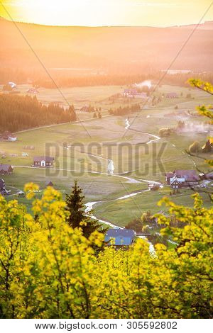 Jizerka Village At Sunset Time. View From Bukovec Mountain, Jizera Mountains, Czech Republic