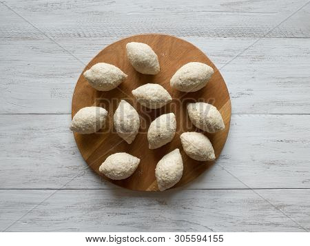 Raw Kibbeh. Cooking Of Arabic Meat Appetizer Kibbeh. Traditional Arabic Kibbeh With Lamb And Pine Nu