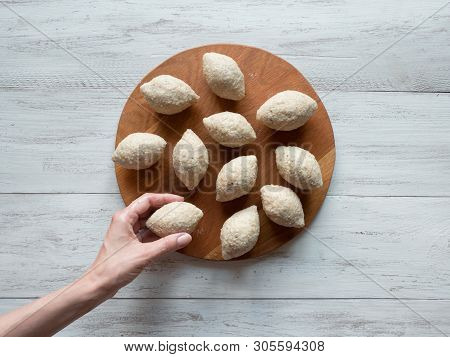 Raw Kibbeh. Cooking Of Arabic Meat Appetizer Kibbeh. Traditional Arabic Kibbeh With Lamb And Pine Nu