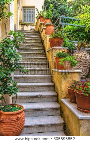 Old Narrow Street In Plaka District, Athens, Greece. Plaka Is A Famous Tourist Attraction Of Athens.