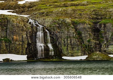 Mountain Lake Flotvatnet With Waterfall. Scenic Region Between Aurland And Laerdal In Norway. Nation