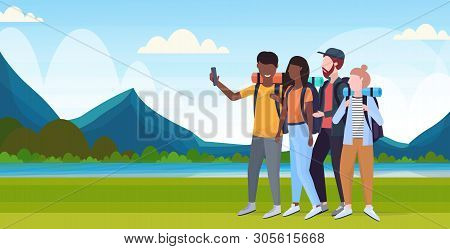 Group Tourists Hikers With Backpacks Taking Selfie Photo On Smartphone Camera Hiking Concept Mix Rac