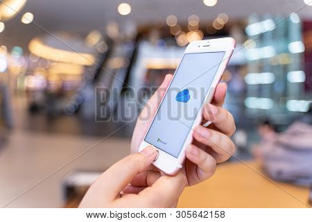 Chiang Mai, Thailand - May.10,2019: Woman Holding Apple Iphone 6s Rose Gold With Onedrive On Screen.