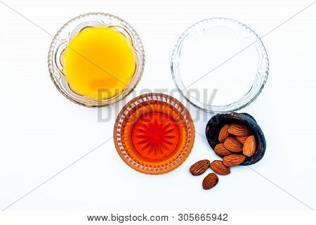 Natural Ex-foliating Face Mask Isolated On White In A Glass Bowl I.e. Raw Milk Well Mixed With Honey