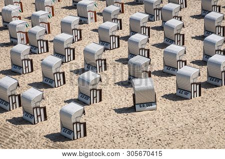 Beach Chairs On The Baltic Sea Coast In Goehren, Germany.