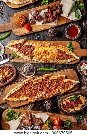 Traditional Turkish Cuisine. Pizza, Pita, Pidesi, Sucuk, Hummus, Kebab, Bulgar. Many Dishes On The T