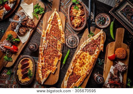 Traditional Turkish Cuisine. Pizza, Pita, Pidesi, Sucuk, Hummus, Kebab, Bulgar. Many Dishes On The T