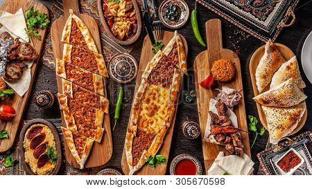 Traditional Turkish Cuisine. Pizza, Pita, Pidesi, Sucuk, Hummus, Kebab, Bulgar. Many Dishes On The T