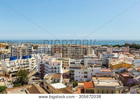 Aerial. The Southern City Of Portugal Faro View From The Top.
