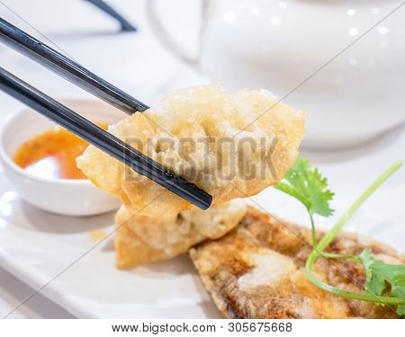 Delicious Dim Sum, Famous Cantonese Food In Asia - Fried Fish And Dumplings With Lemon, Sauce And Te
