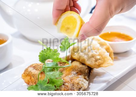 Delicious Dim Sum, Famous Cantonese Food In Asia - Fried Fish And Dumplings With Lemon, Sauce And Te