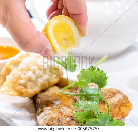 Delicious Dim Sum, Famous Cantonese Food In Asia - Fried Fish And Dumplings With Lemon, Sauce And Te