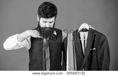 Making Necessary Purchase. Bearded Man Buying Fashion Purchase In Mens Store Department. Businessman
