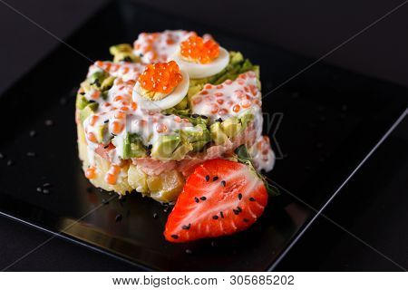Round Salad Made Of Red Fish Potato And Avocado