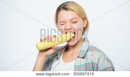 Strong Teeth Of Woman Bite Raw Corn. Healthy Teeth. Farming, Farmer Girl With Maize. Agriculture And