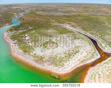 Amazing Aerial View Of Small Red Water River And Green Water Lake In Baskunchak