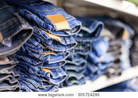 Jeans Clothes Lies Stacked In A Clothes Shop