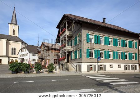 Alberschwende, Austria - October 18, 2018. Main Village Square With Old Parish Church Of Saint Marti