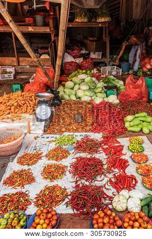 Makassar, Sulawesi, Indonesia - February 28, 2019: Terong Street Market. Colorful Display On White T