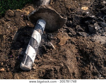 The Road Repairing Works With Jackhammer. Machine Drills Asphalt