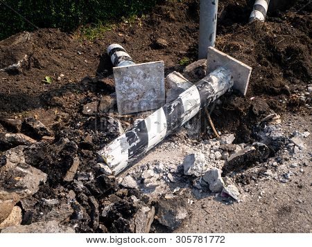 The Road Repairing Works With Jackhammer. Machine Drills Asphalt