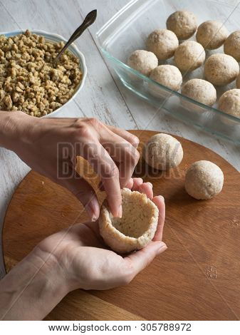 Cooking Of Arabic Meat Appetizer Kibbeh. Traditional Arabic Kibbeh With Lamb And Pine Nuts.