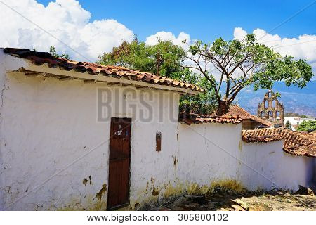 Old Colonial Street With Background Of Church In Guane, Colombia