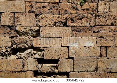 Background Texture Of Limestone Blocks Wall. Old Fortress Wall Blocks