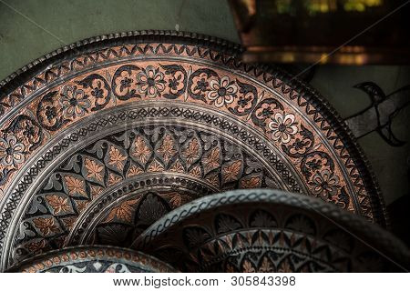 Copper Plate Handcrafted, Traditionally Made In Lagich, Azerbaijan. Handmade Plate In Souvenir Shop.