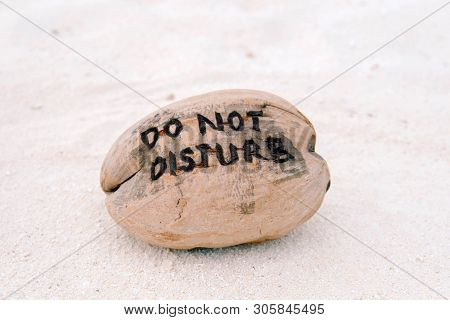 Do Not Disturb Sign On The Beach, Maldives. Privacy Concept.