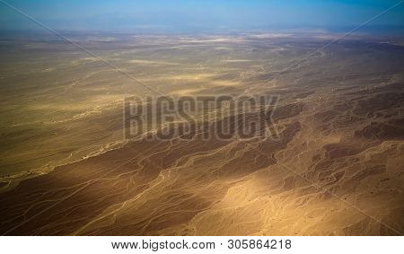 Aerial Airplane Panoramic View To Nazca Plateau With Geoglyph Lines , Ica Region, Peru