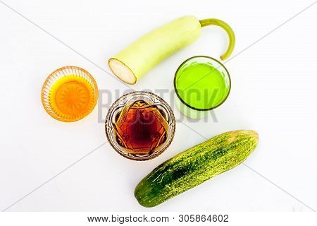 Bottle Gourd Face Pack Isolated On White I.e. Bottle Gourd Or Lauki Juice Well Mixed With Cucumber,