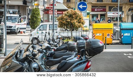 Motorcycle And Taxis Parking Near Town Hall In Irun, Spain