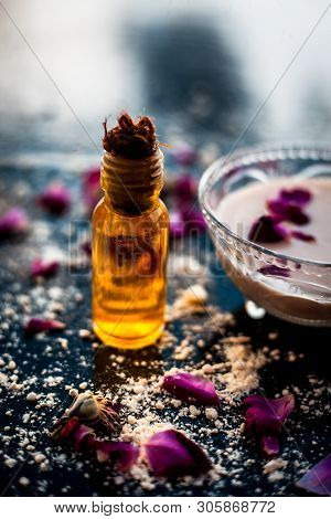 Perfect Remedy For Dry Feet On Wooden Surface I.e. Chikoo Pulp In A Bowl Well Mixed With Castor Oil