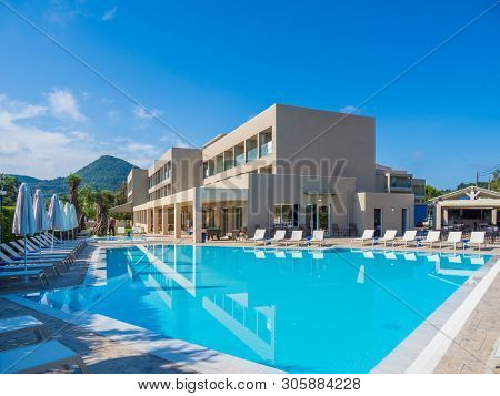 Swimming pool at the summer holydays resort hotel 
