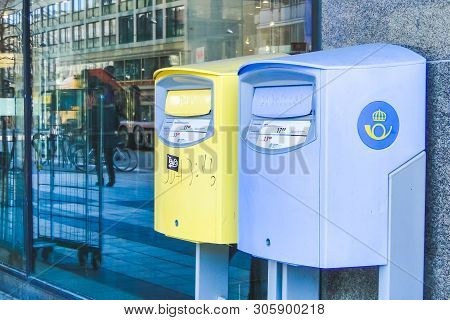 Stockholm, Sweden - Mar 21, 2013 - Blue And Yellow Mailboxes In Stockholm, Sweden.