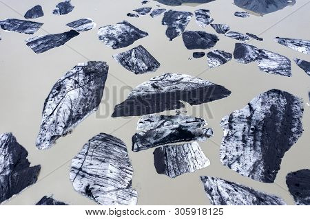Aerial View Of Floating Icebergs. Svinafellsjokull Glacier Lake, Iceland