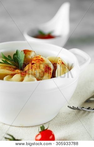 Meat Dumplings - Russian Pelmeni, Ravioli With Meat On A White Bowl.