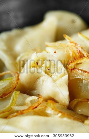 Dumplings, Filled With Mashed Potatoes And Onions. Russian, Ukrainian Or Polish Dish: Varenyky, Vare
