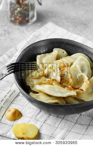 Dumplings, Filled With Mashed Potatoes And Onions. Russian, Ukrainian Or Polish Dish: Varenyky, Vare