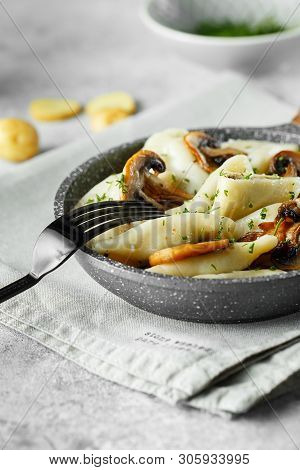 Dumplings, Filled With Mashed Potatoes And Mushrooms. Russian, Ukrainian Or Polish Dish: Varenyky, V