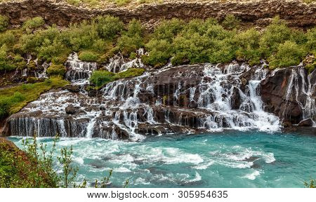 Hraunfossar Waterfall Powerful Streams Falling Into Hvita River Turquoise Waters, Husafell, Western 