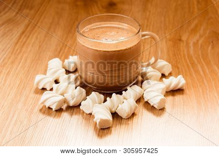 Cup Of Cocoa And March Mellow On The Table