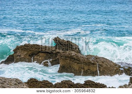 raging and furious sea breaking against the rocks, Cantabrian Sea in the North of Spain
