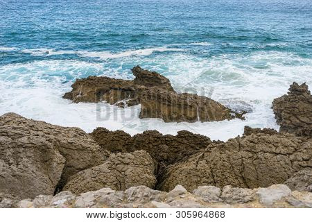 raging and furious sea breaking against the rocks, Cantabrian Sea in the North of Spain