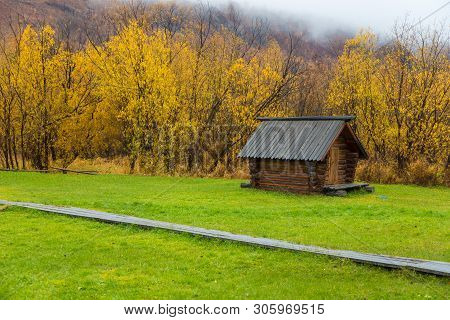 Esso, Kamchatka Peninsula, Russia- 02 October 2014: Wooden, Old House On The Meadow, Exhibition Of T