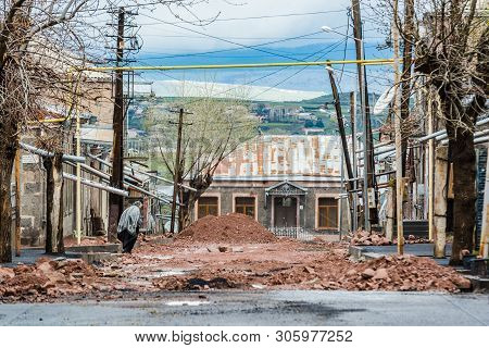Akhalkalaki, Georgia - May 9, 2017. Eaves Heading To The Broken Street