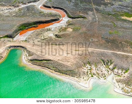 Amazing Aerial View Of Small Red Water River And Green Water Lake Baskunchak