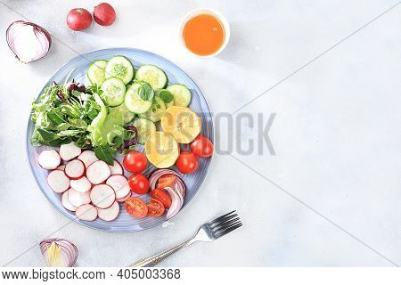 Green Vegetable Salad With Cherry Tomatoes, Cucumber, Radish And Fresh Arugula, Detox Diet. Healthy 
