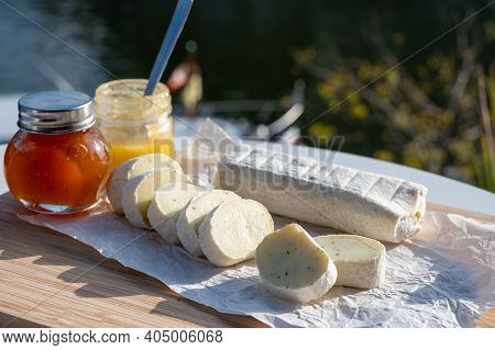 Belgian Abbey Cheese Fagotin In Pieces With Jam Served Outdoor In Wallonia, Belgium